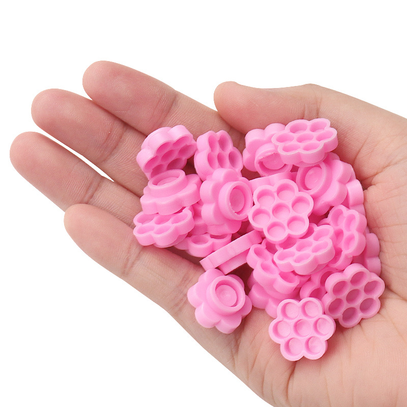 100 Pcs Pink Flower Glue Delay - огляд і ціна Eyelash Extension Repair